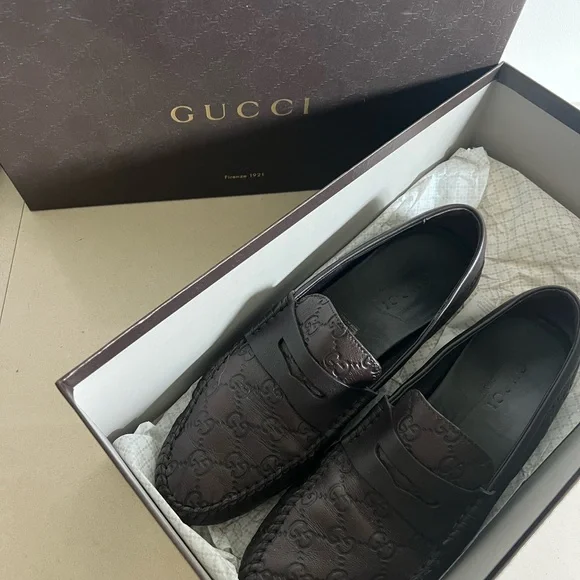 Gucci Men\'s Dark Brown Embossed Loafers. 7.5. Men main image 2